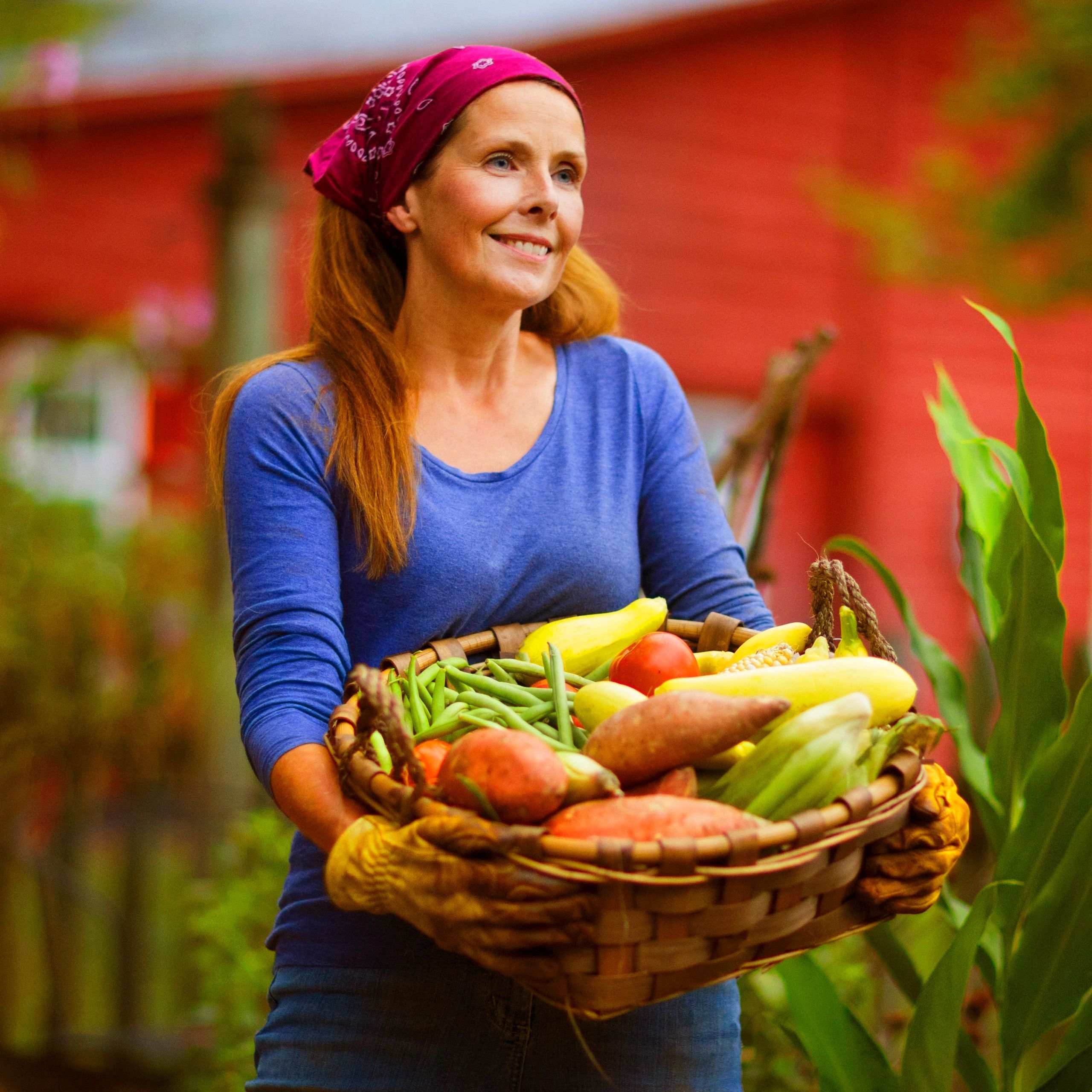 Happy customer holding fresh vegetables